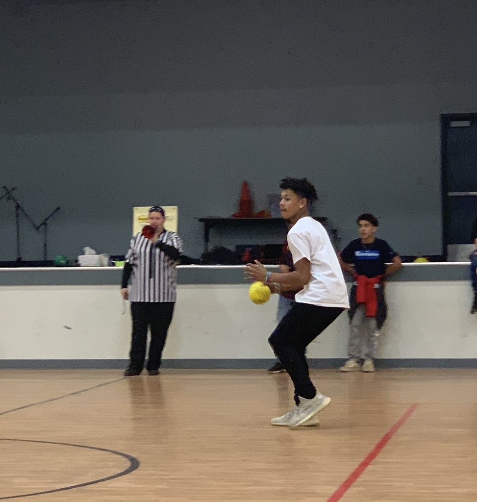 8th grade boy playing dodgeball